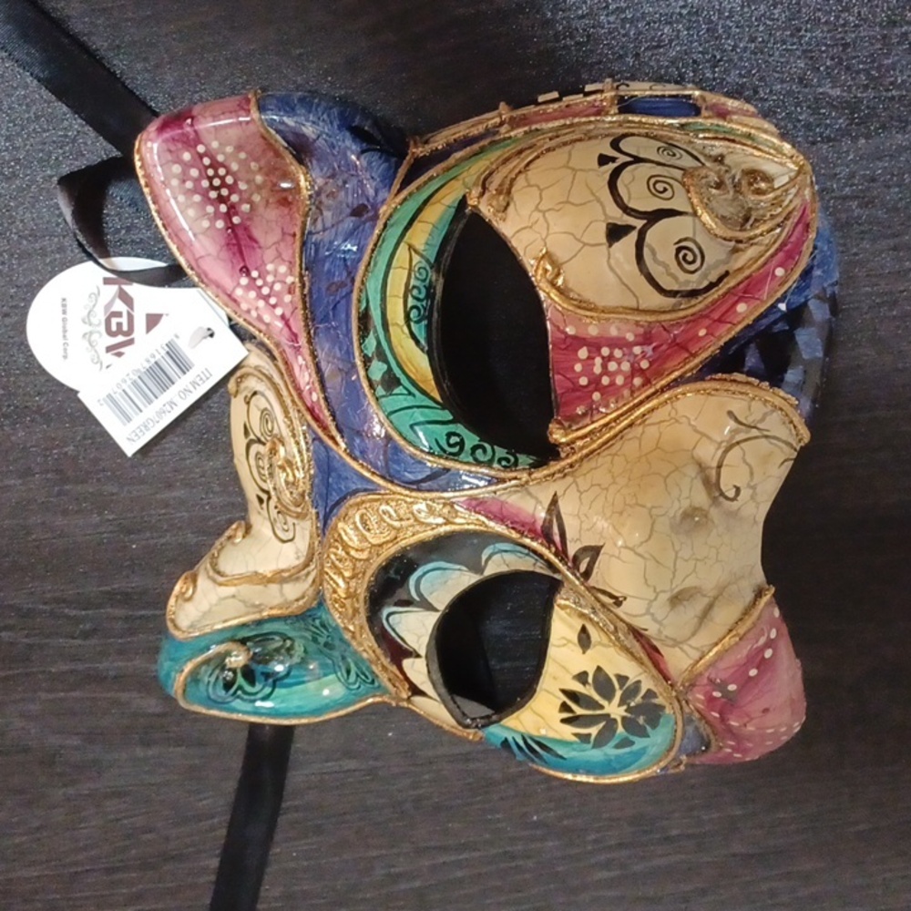 Elegant Multicolor Cat Face Mask with Gold Details